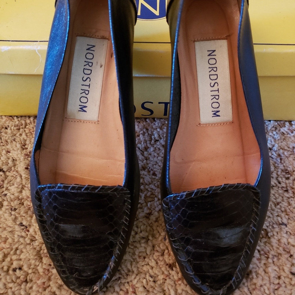 Black leather flats